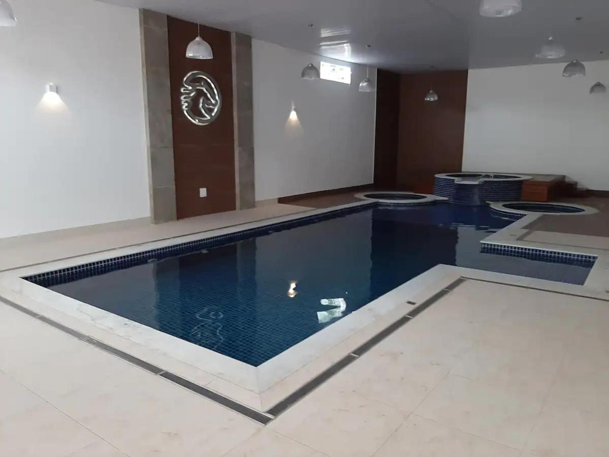 Апартаменти Agradavel Flat - Cavalinho Branco - Агуас-ді-Ліндоя Екстер'єр фото